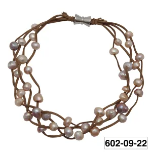 602-09-22 | TAN SUEDE 4-STRAND MULTI PEARL NECKLACE