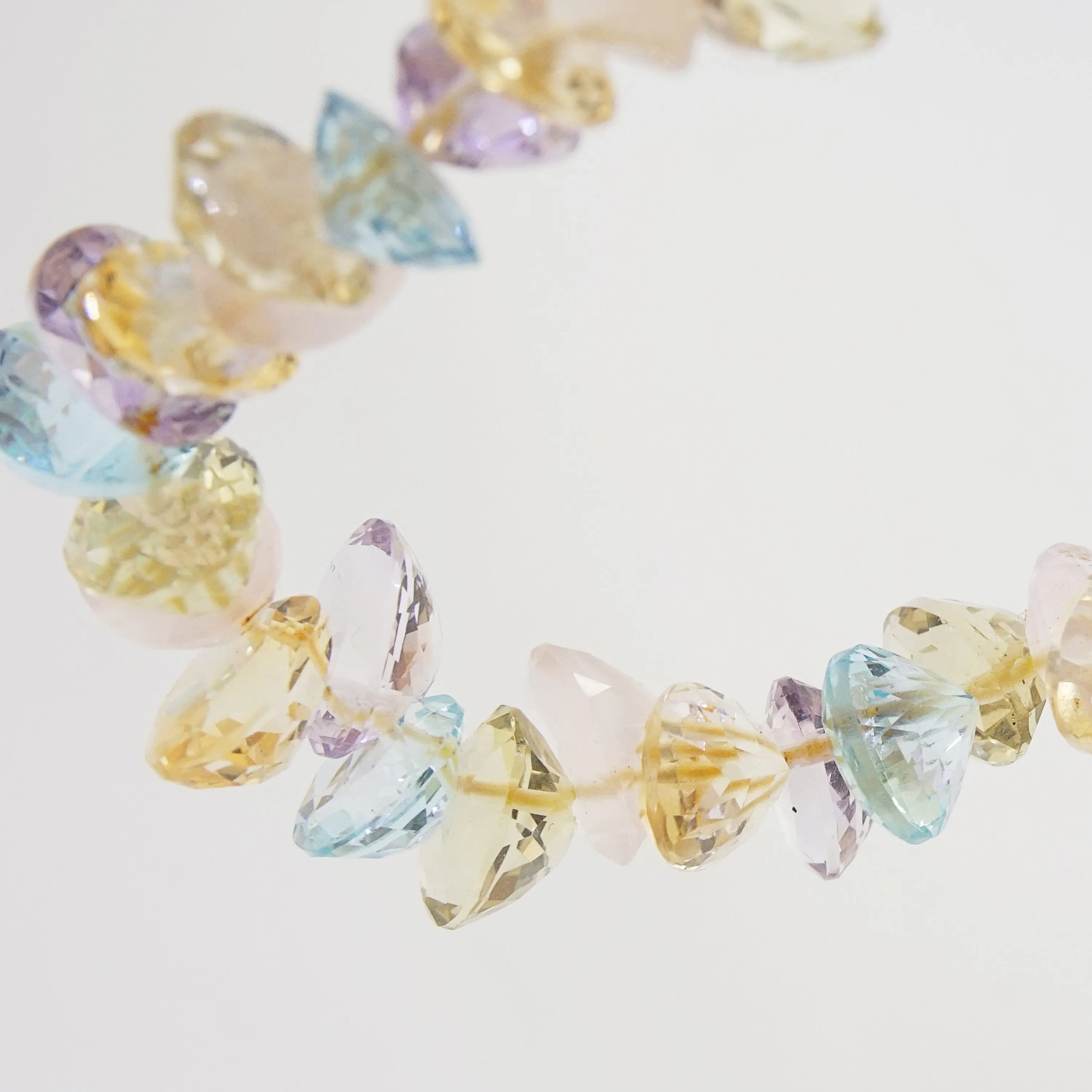 Gem-Grade Blue Topaz, Amethyst, Rose Quartz, Citrine Briolette