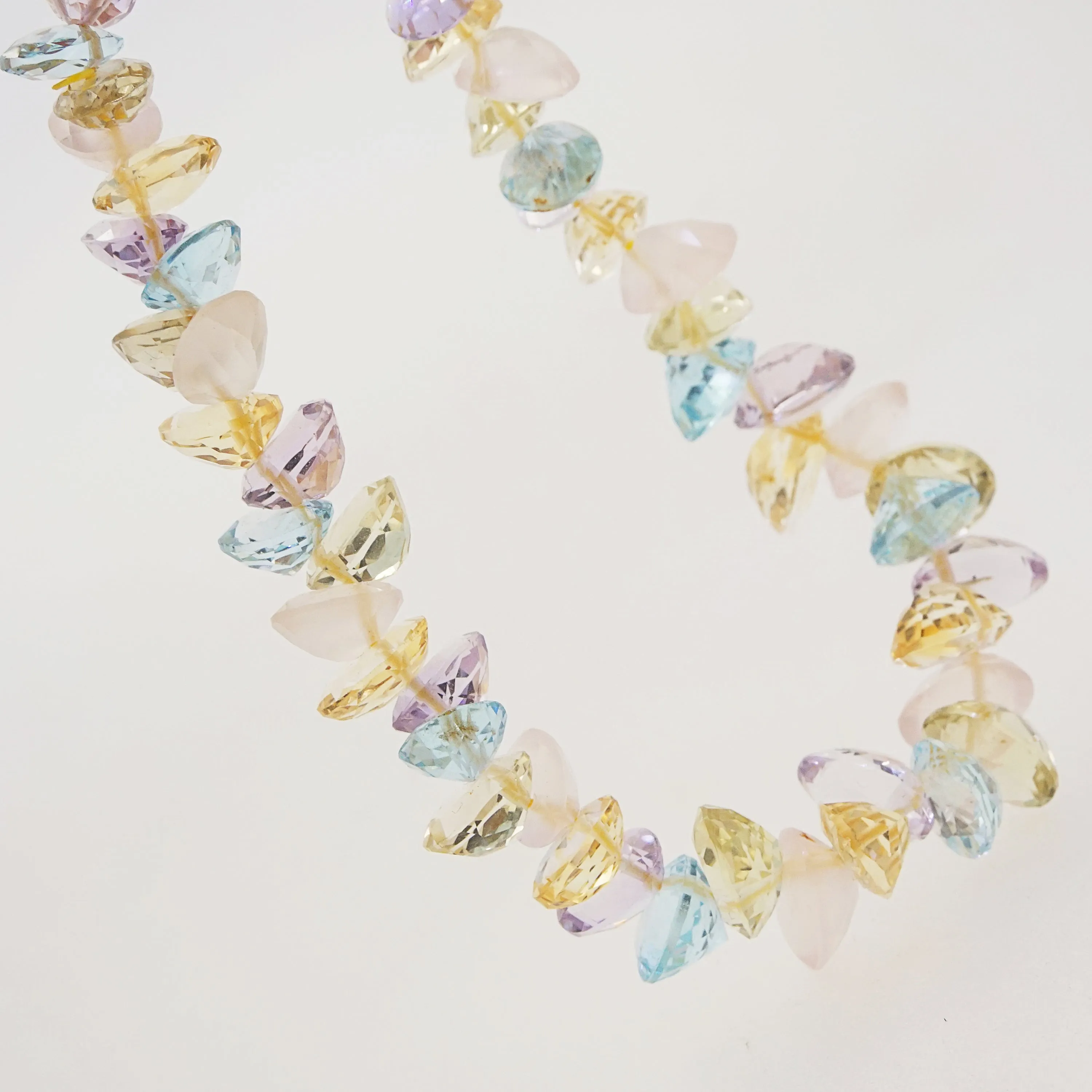 Gem-Grade Blue Topaz, Amethyst, Rose Quartz, Citrine Briolette