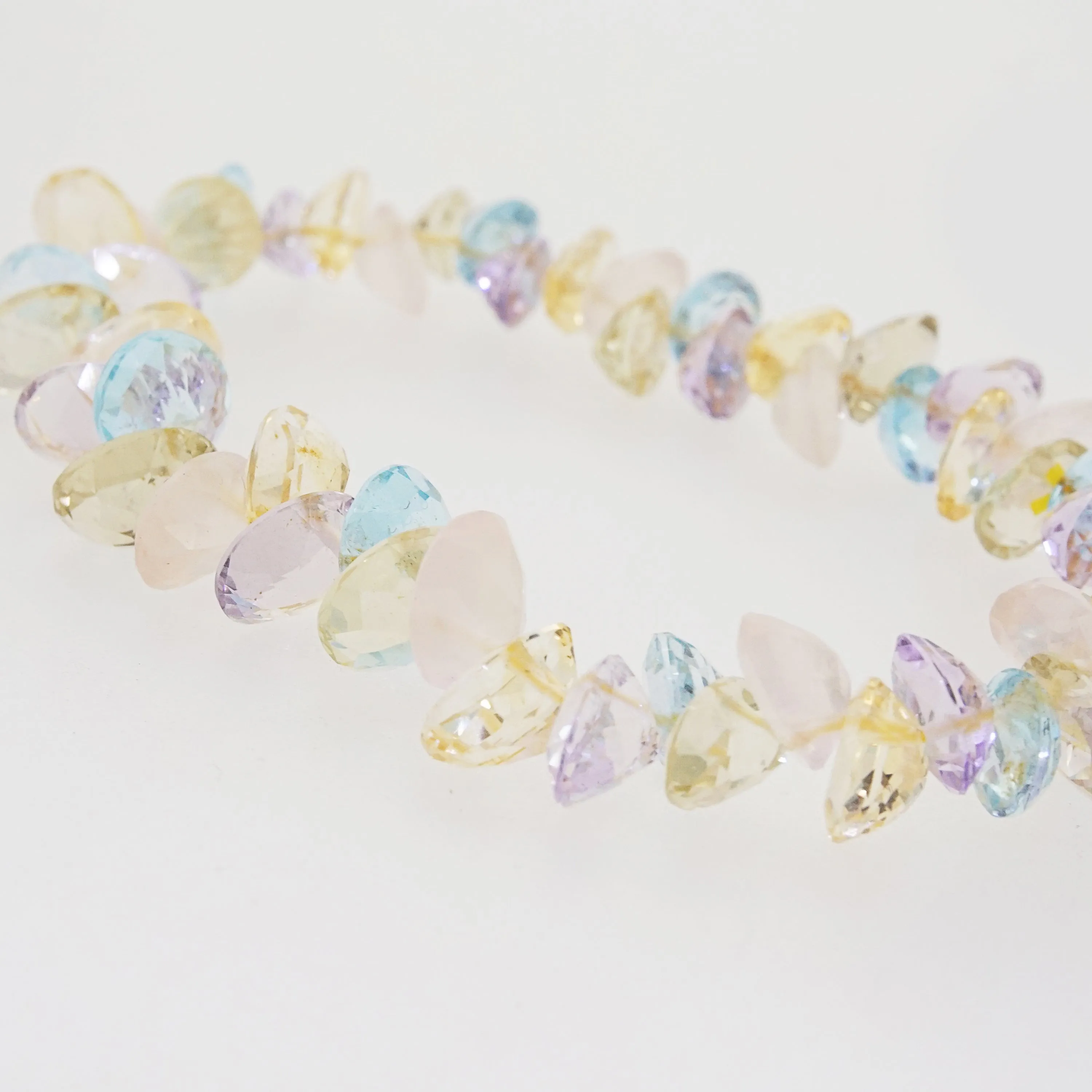 Gem-Grade Blue Topaz, Amethyst, Rose Quartz, Citrine Briolette