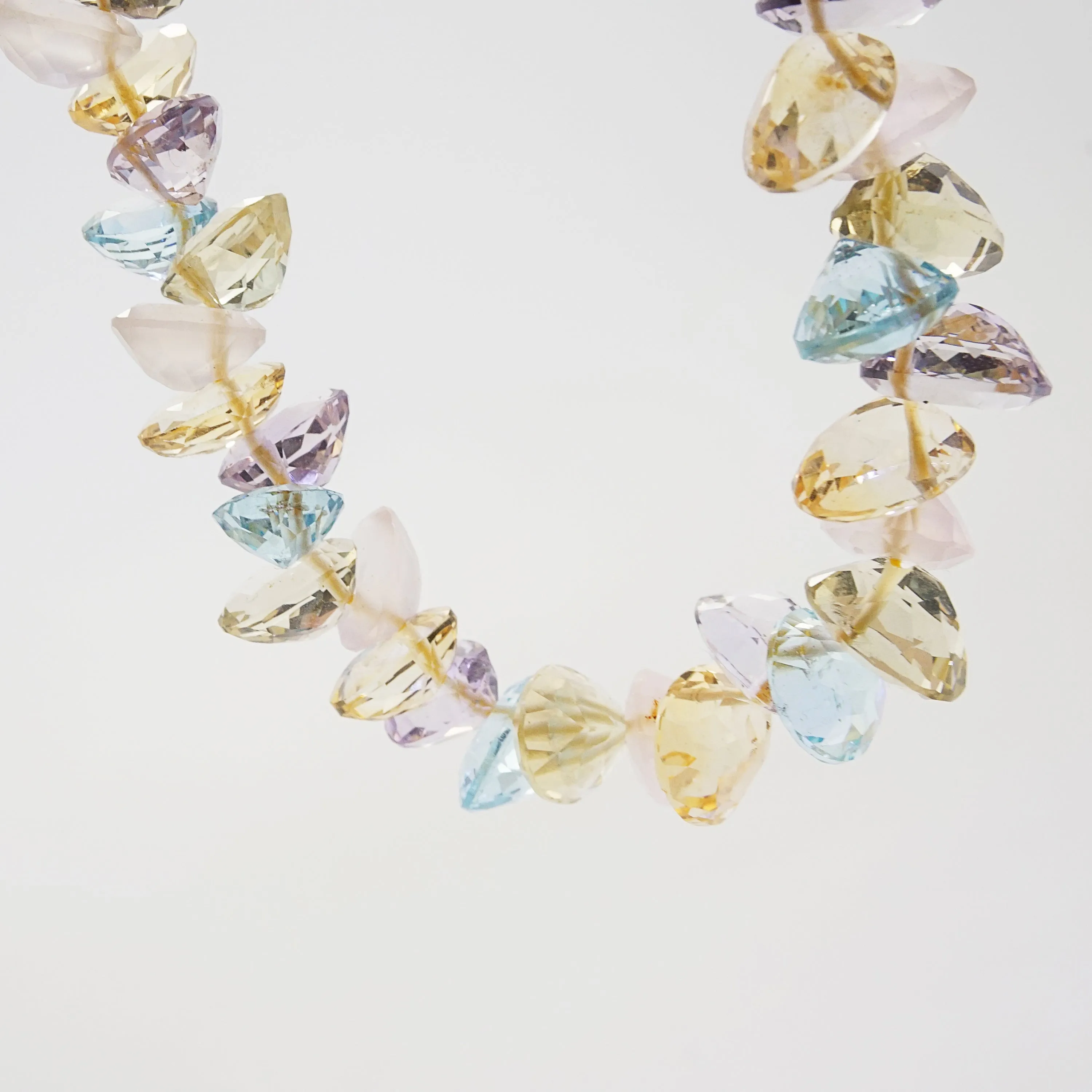 Gem-Grade Blue Topaz, Amethyst, Rose Quartz, Citrine Briolette