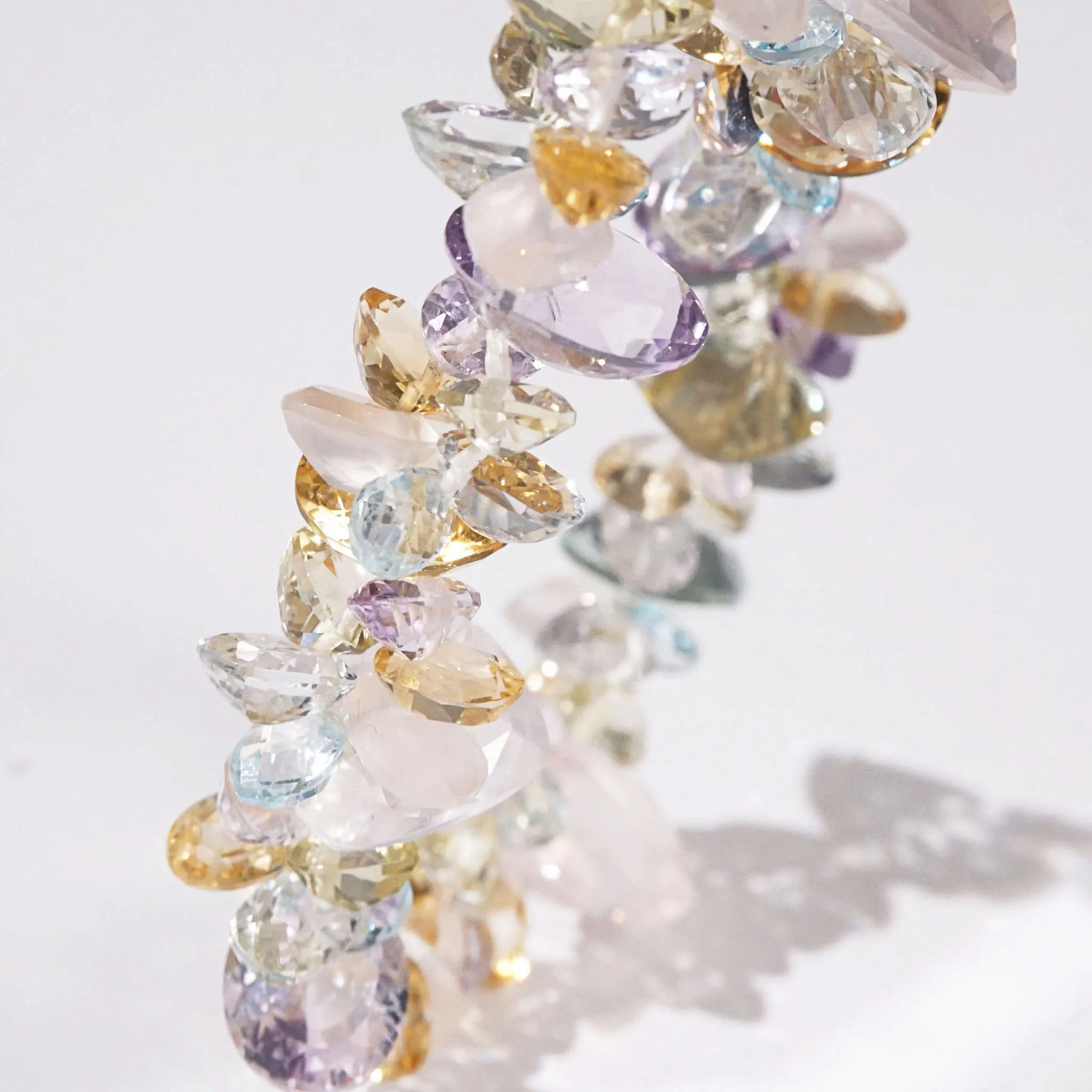 Gem-Grade Rose Quartz, Amethyst, Citrine, Prasiolite, Blue Topaz Briolette