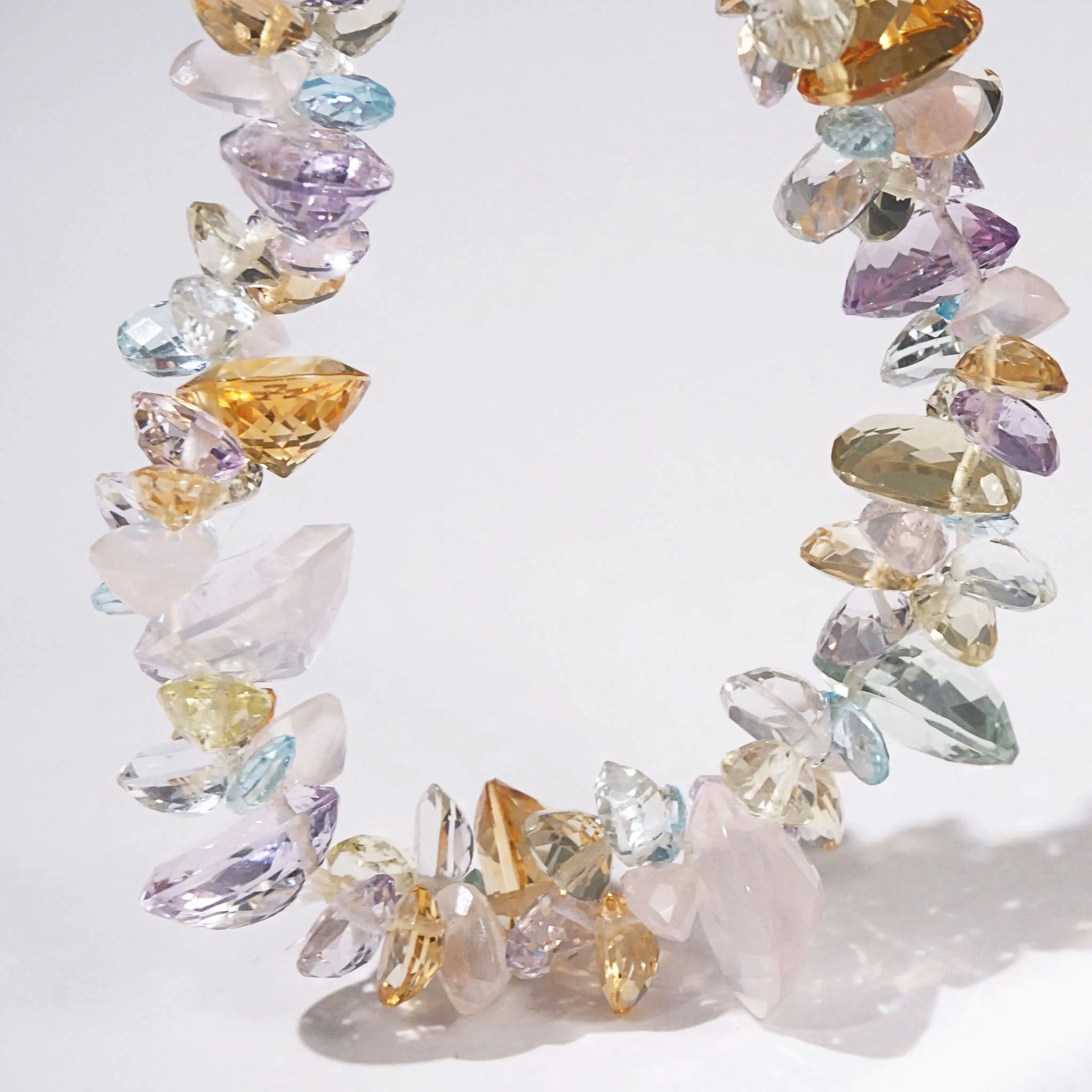 Gem-Grade Rose Quartz, Amethyst, Citrine, Prasiolite, Blue Topaz Briolette