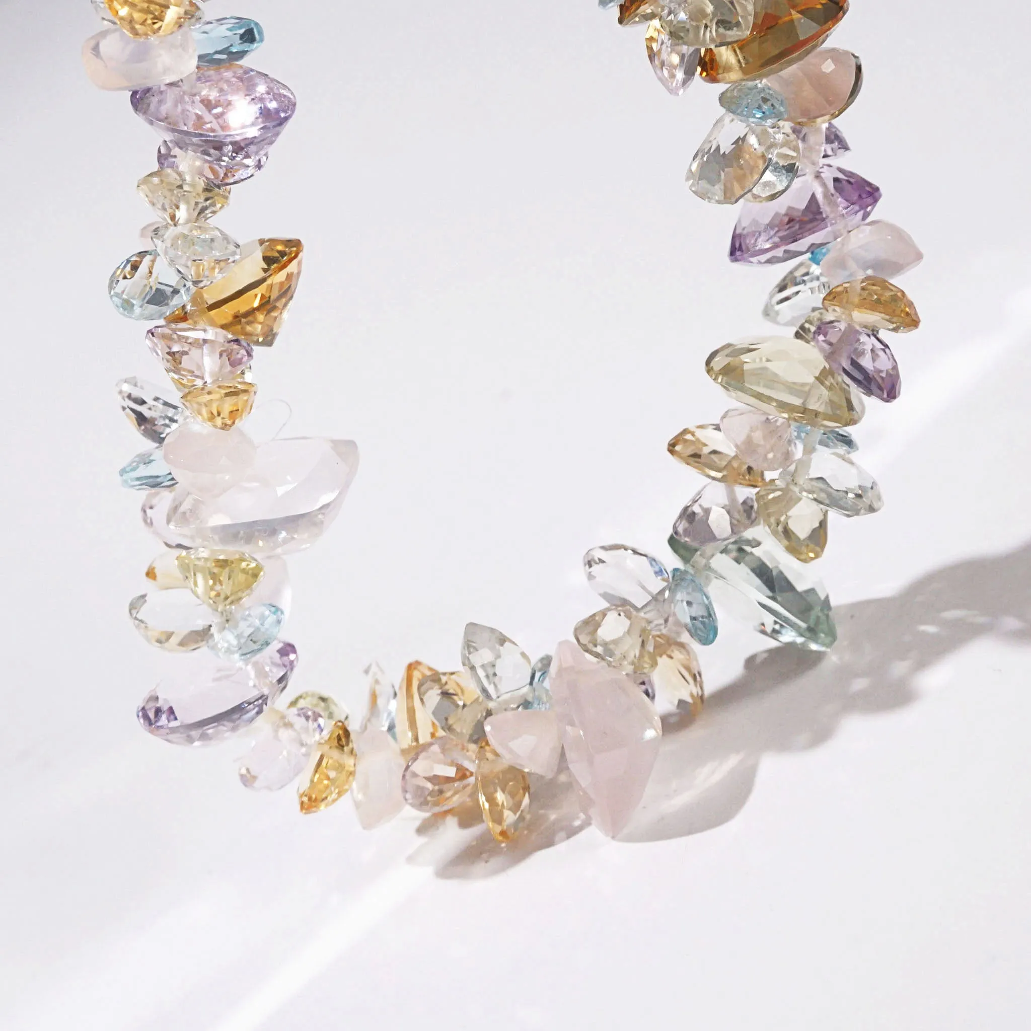 Gem-Grade Rose Quartz, Amethyst, Citrine, Prasiolite, Blue Topaz Briolette