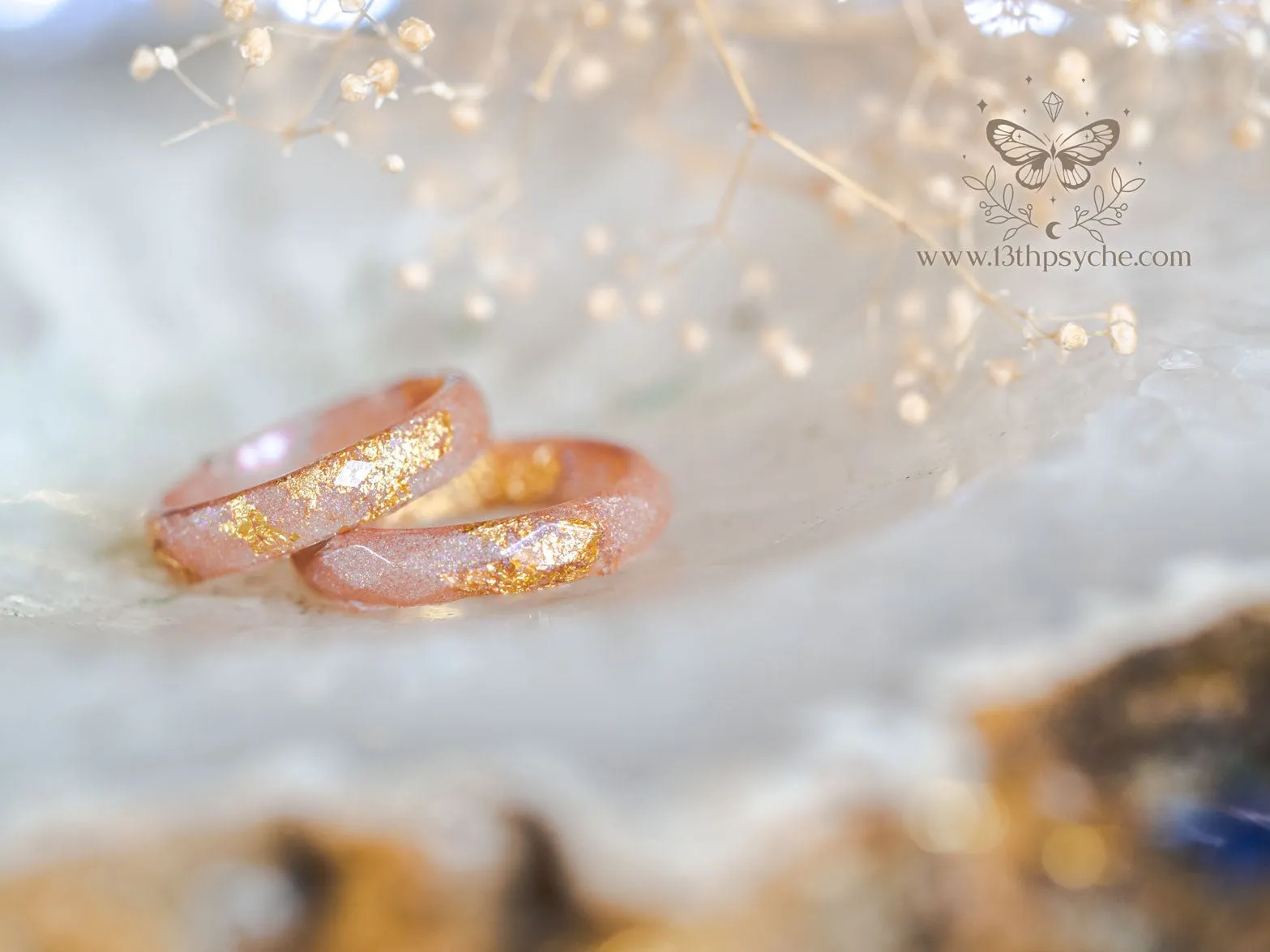 Iridescent pink faceted resin ring with gold metal flakes