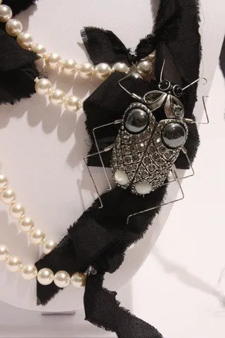 LANVIN Pearl, Ribbon, and Beetle Necklace