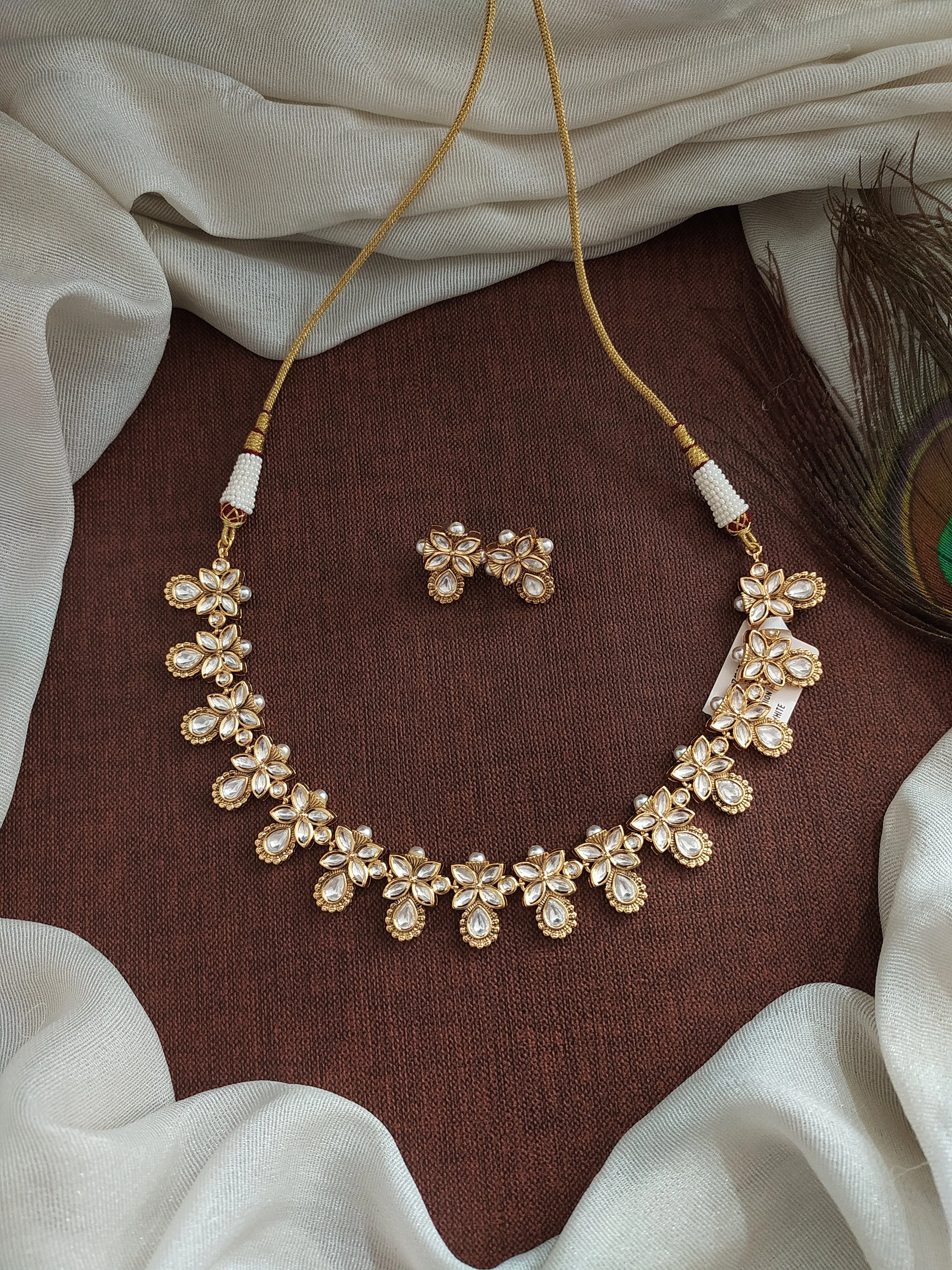 Mesmerizing Floral Design Polki Kundan Necklace Set