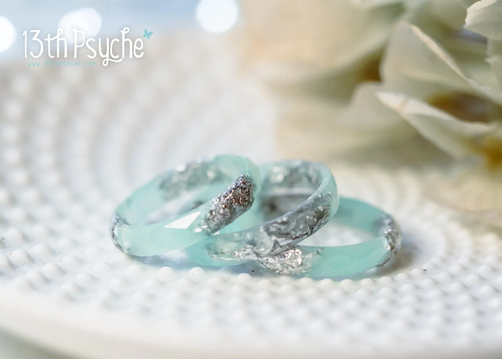 Pastel green mint and silver flakes faceted resin ring