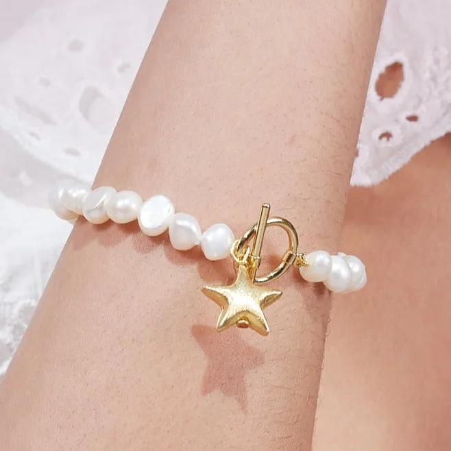 Stella cultured freshwater irregular pearl bracelet with a gold-plated star charm